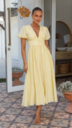 Long V-neck dress with puffed sleeves