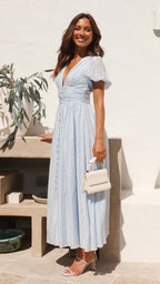 Long V-neck dress with puffed sleeves