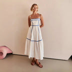Midi dress with thin straps and ruffled skirt