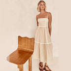 Midi dress with thin straps and ruffled skirt